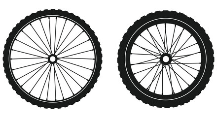 Bicycle wheels with black tires and spokes on white background