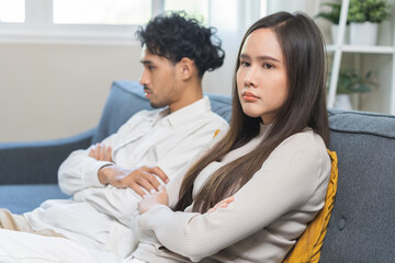 Obraz premium Breakup and depressed, asian young quarrel couple love fight relationship in trouble. Different people are emotion angry. Argue wife has expression upset with husband. Problem of family people.