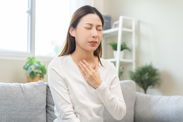 Acid reflux disease, suffer asian young woman have symptom gastroesophageal, esophageal, stomach...