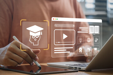 Digital Education and Online Learning Concept. Person using laptop with virtual of e-learning, online courses, video tutorials, and smart education tools in modern digital classroom environment