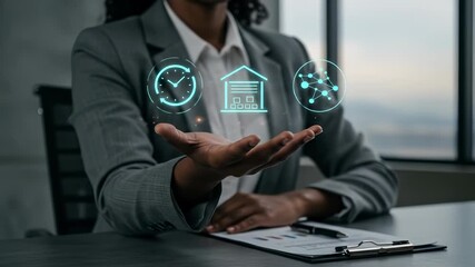 Smart Logistics: A professional Black businesswoman manages future warehouse and inventory with innovative supply chain network technology for ultimate efficiency in a modern office. - Powered by Adobe