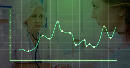 Reviewing medical results, physician consulting patient in clinic, with stethoscope and line chart