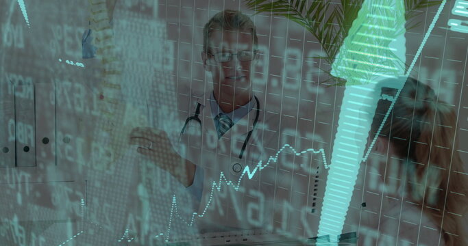 Male doctor wearing lab coat explaining spinal model and reviewing charts during consult with X-ray - Powered by Adobe