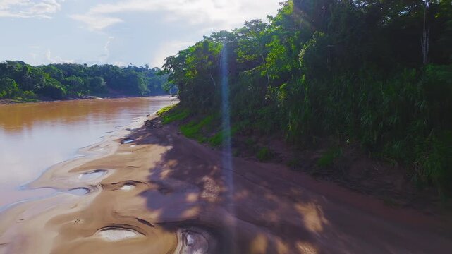 Tambopata Riverbank with Sandbank Pools and Amazon Rainforest in Peru, Aerial View