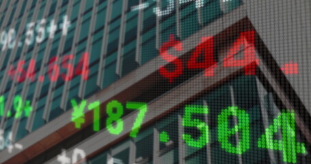 Overlaying stock ticker scrolling across high-rise glass and metal facade with green red numerals
