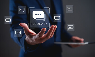 A business professional presents a feedback interface, symbolizing communication and engagement in a digital environment.