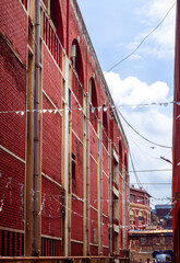 Architectural View of Red Brick Building with Arches and Urban Details in India