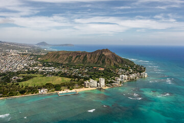Aerial View of Diamond Head Crater and Waikiki Beach Coastline in Honolulu Hawaii - Iconic Volcanic Landmark with Turquoise Ocean Waters © Samer Saad