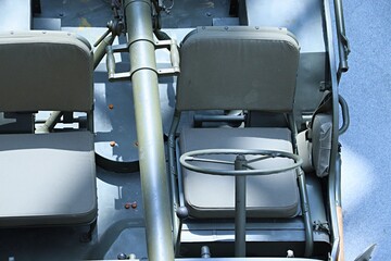 close up of driving position of military vehicle from WWII