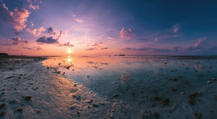 Panoramic sunset over calm ocean
