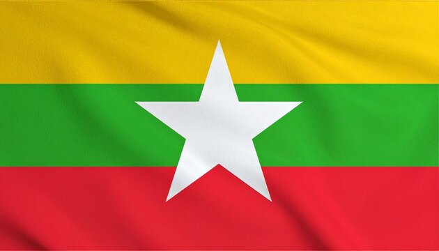Myanmar&rsquo;s flag with yellow, green, and red stripes and central white star, symbolizing solidarity, peace, courage, and national unity.