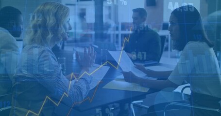 team collaborating on reports and analyzing market trends following financial charts fading in - Powered by Adobe