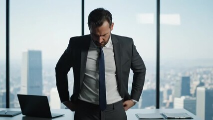  businessman in a suit pulling out his empty pockets, with a subtle motion showing financial struggle or bankruptcy - Powered by Adobe
