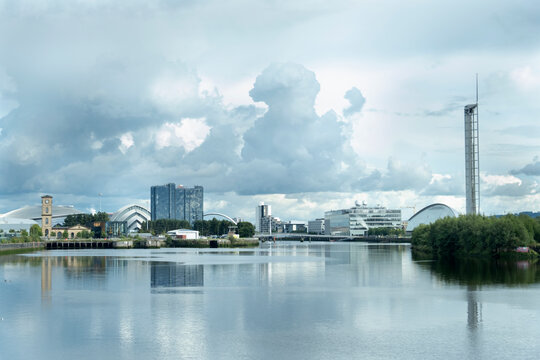Glasgow science centre reflecting on river clyde under cloudy sky, Scotland - Powered by Adobe