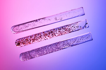 Serums in test tubes in the photo with the spirit of experimentation and technology.