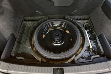 Spare wheel in the trunk of a modern car