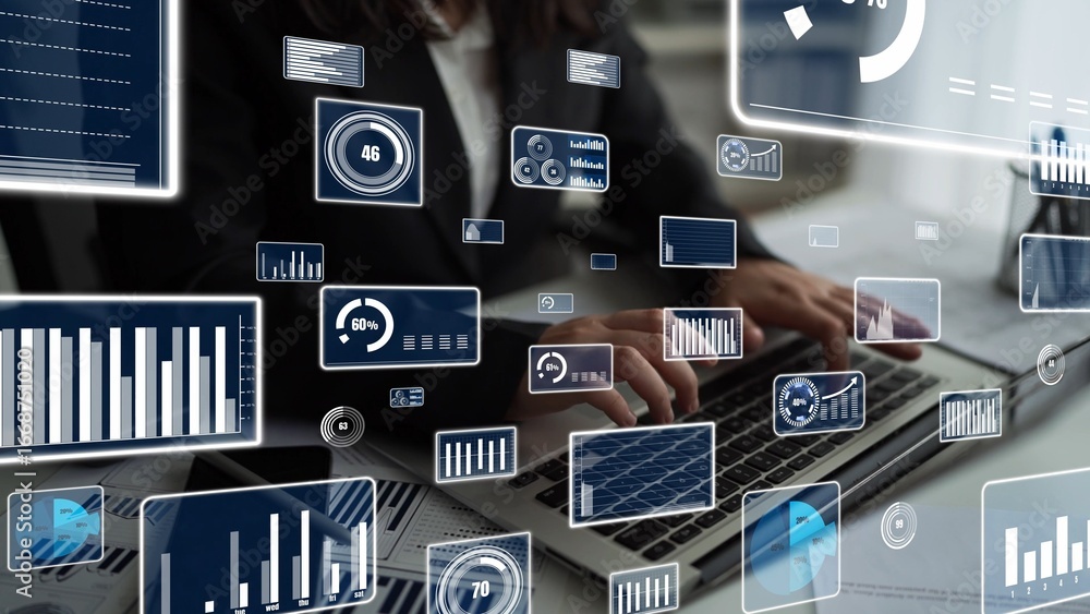 Poster a person types on a laptop while surrounded by digital data visualizations. this image represents th