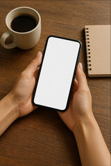 Hand Holding Smartphone with Blank Screen on Wooden Table with Coffee