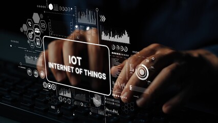 Hands Typing on Keyboard with Digital Icons Representing Internet of Things Concept and Data Visualization Trends. Asymptotic smart data analytic.
