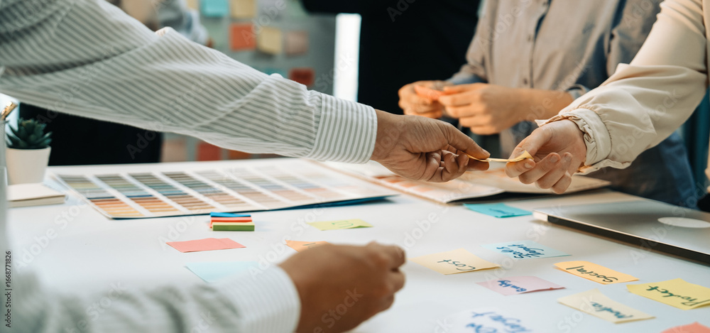 Poster a vibrant and dynamic scene showcasing a group engaged in a brainstorming session with colorful stic