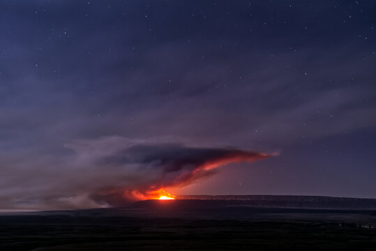 Dragon Bravo Wildfire at the Grand Canyon viewed from Antelope Pass on Echo Cliffs at night, Arizona, USA
