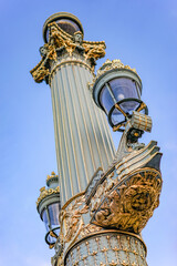 A pole with lanterns located on the Place de la Concorde in Paris France The photo was taken in the...