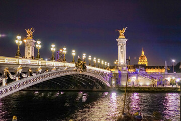 Bridge Alexander 3 in the evening The photo was taken late in the evening when the lights on the bridge were already on The home for the Invalides is visible in the background