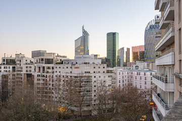 A city skyline with a tall building in the middle in Paris France