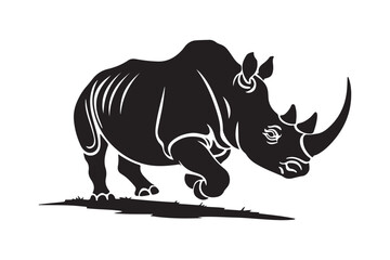 Powerful black silhouette of a charging rhinoceros