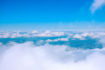 Stunning panoramic view of a cable car ascending Mount Pilatus in the Swiss Alps. The bright red gondola contrasts beautifully with the rugged mountain cliffs, lush green slopes, and distant snow-capp © Breg
