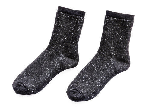 Two black socks with a shiny glittery appearance  isolated on white background ,PNG.AI Generated. - Powered by Adobe