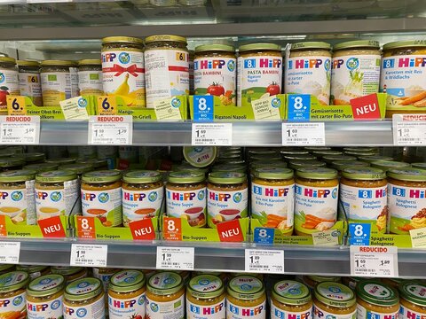 Santa Ponsa, Spain - August 20, 2025: HiPP organic baby food jars neatly arranged on supermarket shelf, showcasing variety of flavors and vibrant packaging, ideal for parents seeking healthy options