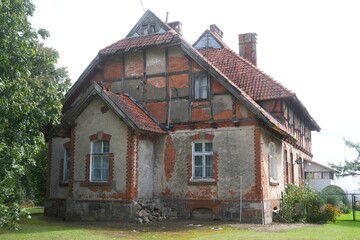 Abandoned brick manor house in the village of Awajki, Warmia, Poland