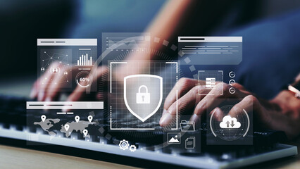 Businesswoman using laptop. digital cybersecurity interface cyber security network and data protection shield on internet with a digital padlock and many folder. encrypted connection password protect