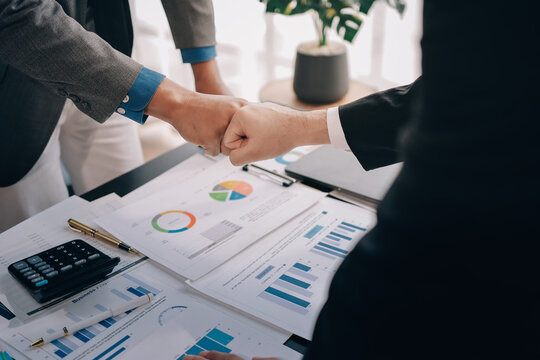 Business handshake for teamwork of business merger and acquisition,successful negotiate,hand shake,two businessman shake hand with partner to celebration partnership and business deal concept