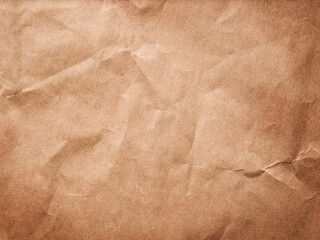 Old crumpled paper sheet or parchment texture background. Element for design. Top view.