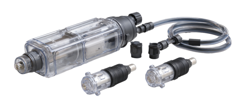 Clear plastic housing encloses a cylindrical device with connectors