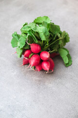 Radish on a gray background. fresh vegetables
