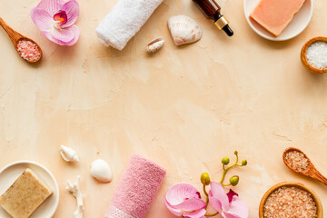 Obraz na płótnie Canvas Set of body care cosmetics products with essential oil scrubs and sea salt, top view. Aromatherapy spa products