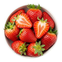 A top down view of a bowl filled with fresh strawberries and two sliced strawberries on white background