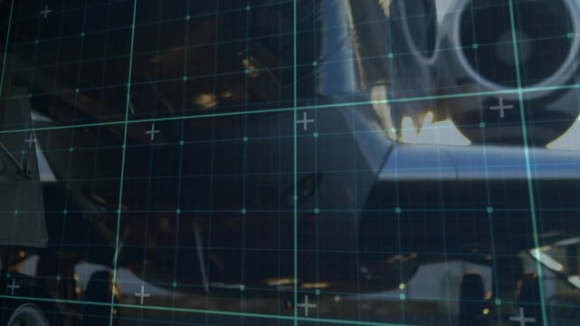 Grid overlay appearing triggers camera panning across landing gear and engine intake for inspection