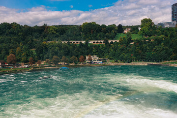 Majestic view of Rhine Falls, the largest waterfall in Europe, located near Schaffhausen in...