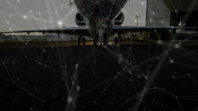 Digital mesh drifting downward and fading while unveiling jet nose for crew conducting inspection