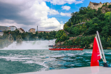 Majestic view of Rhine Falls, the largest waterfall in Europe, located near Schaffhausen in...