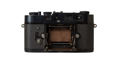 Vintage Camera's Inner Workings: A detailed view of the internal mechanism of a vintage camera, highlighting its intricate design and classic aesthetic.