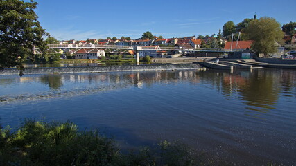 Fototapeta premium Suspension footbridge over the river Otava in Pisek,South Bohemia,Czech Republic,Europe 