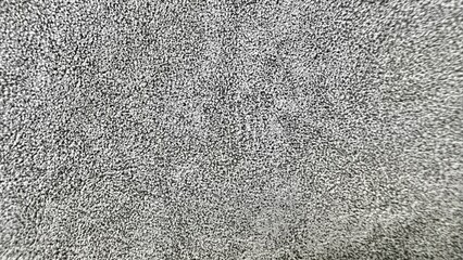 detailed close up of rough gray stucco wall texture with fine grain surface for modern background or architectural design use