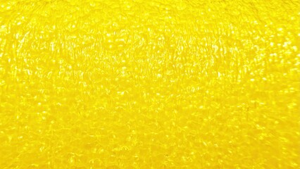 vibrant yellow textured surface with glossy reflective pattern for abstract background or creative...