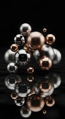 Collection of metallic spheres in silver and bronze on a reflective black surface