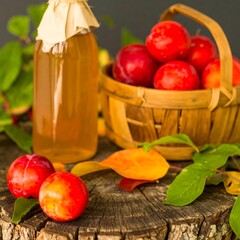 Plums and juice on a stump